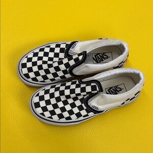 Girls Vans checkered sneakers.  Slide ons.  Still a lot of life left!